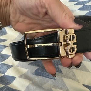 Men’s Ferragamo belt black with gold hardware will fit size 30-34